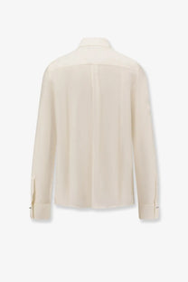 Cream-colored BOSS women’s silk and wool blouse with a classic collar and long sleeves in white shade
