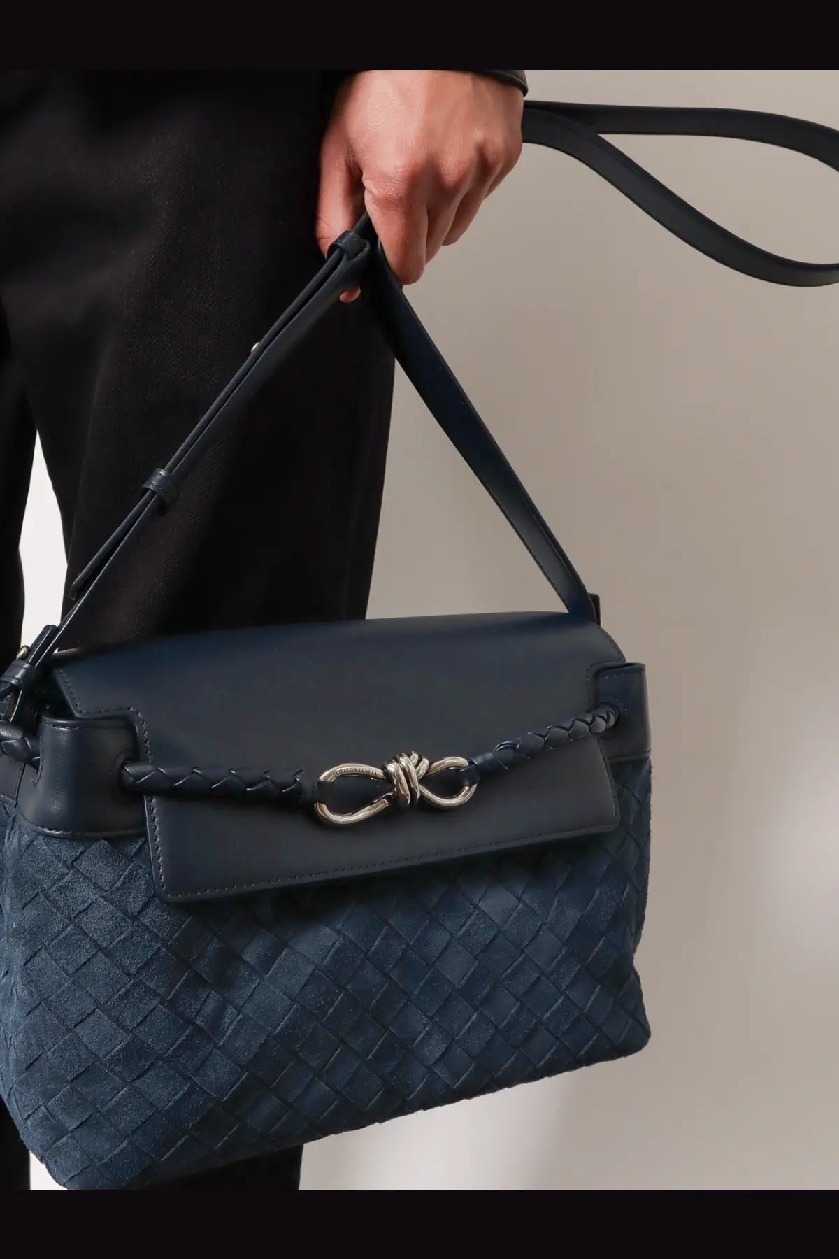 Dark blue woven leather messenger bag with braided strap and silver clasp from bottega veneta neptune vintage silv