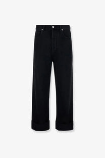 Bottega Veneta men’s black denim wide-leg trousers with high waist and rolled cuffs