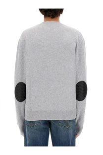 Bottega Veneta men’s white cashmere sweater with gray knit and black woven elbow patches