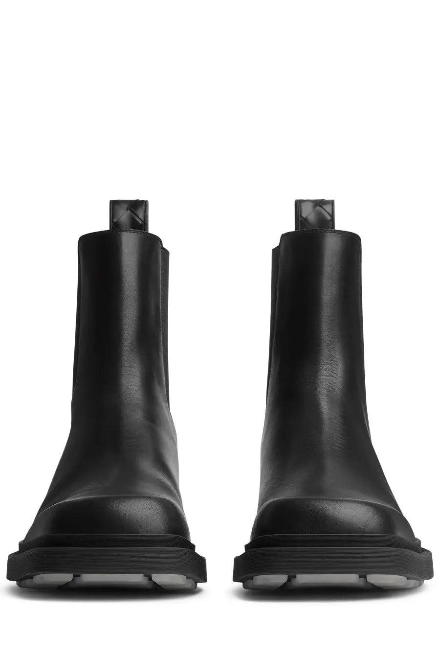 Bottega Veneta men’s black leather chelsea boot with chunky rubber sole and woven strap detail at the back view
