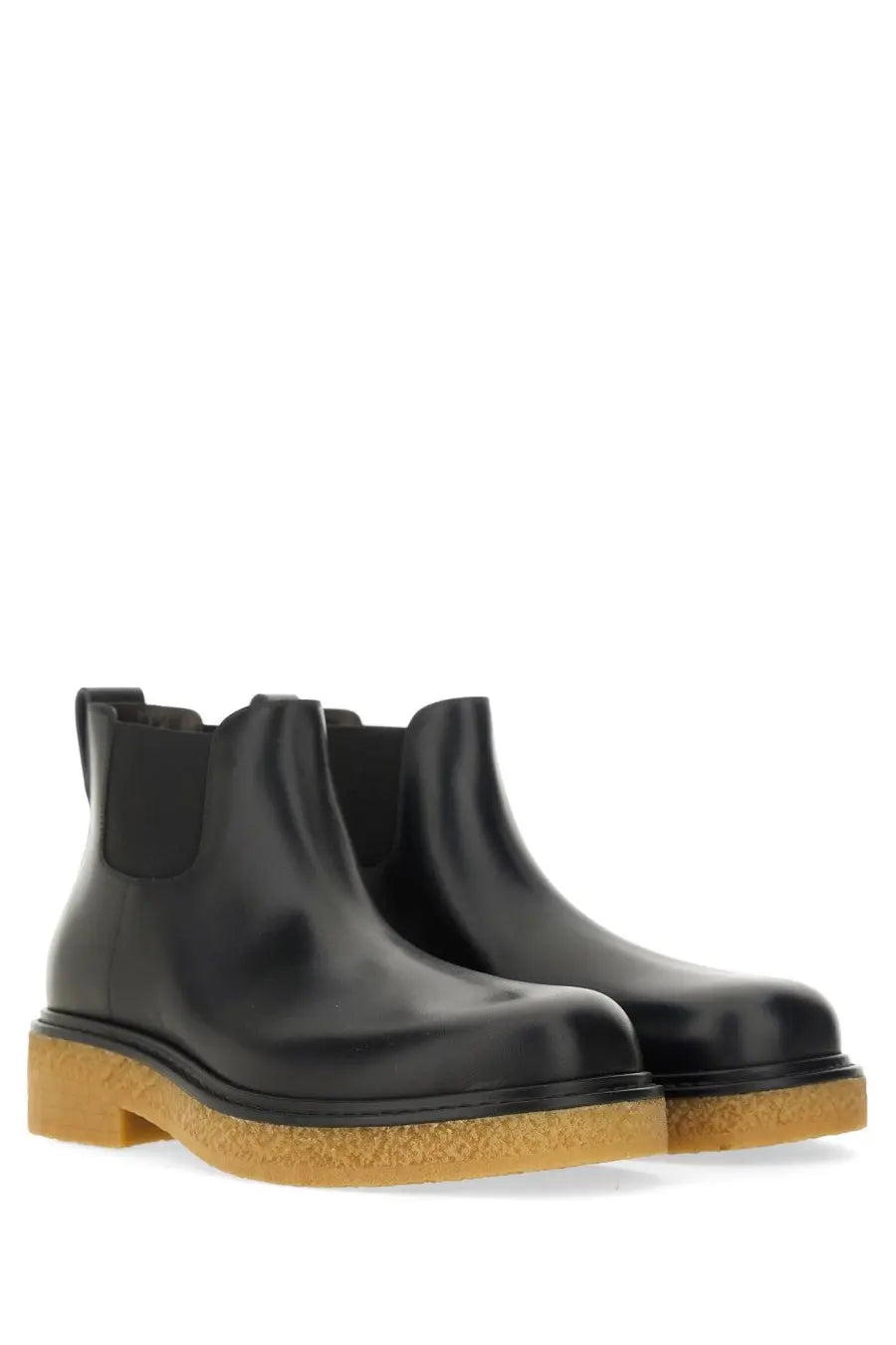 Bottega Veneta men’s Chelsea boot Haddock black in black leather with tan rubber sole and elastic side gussets