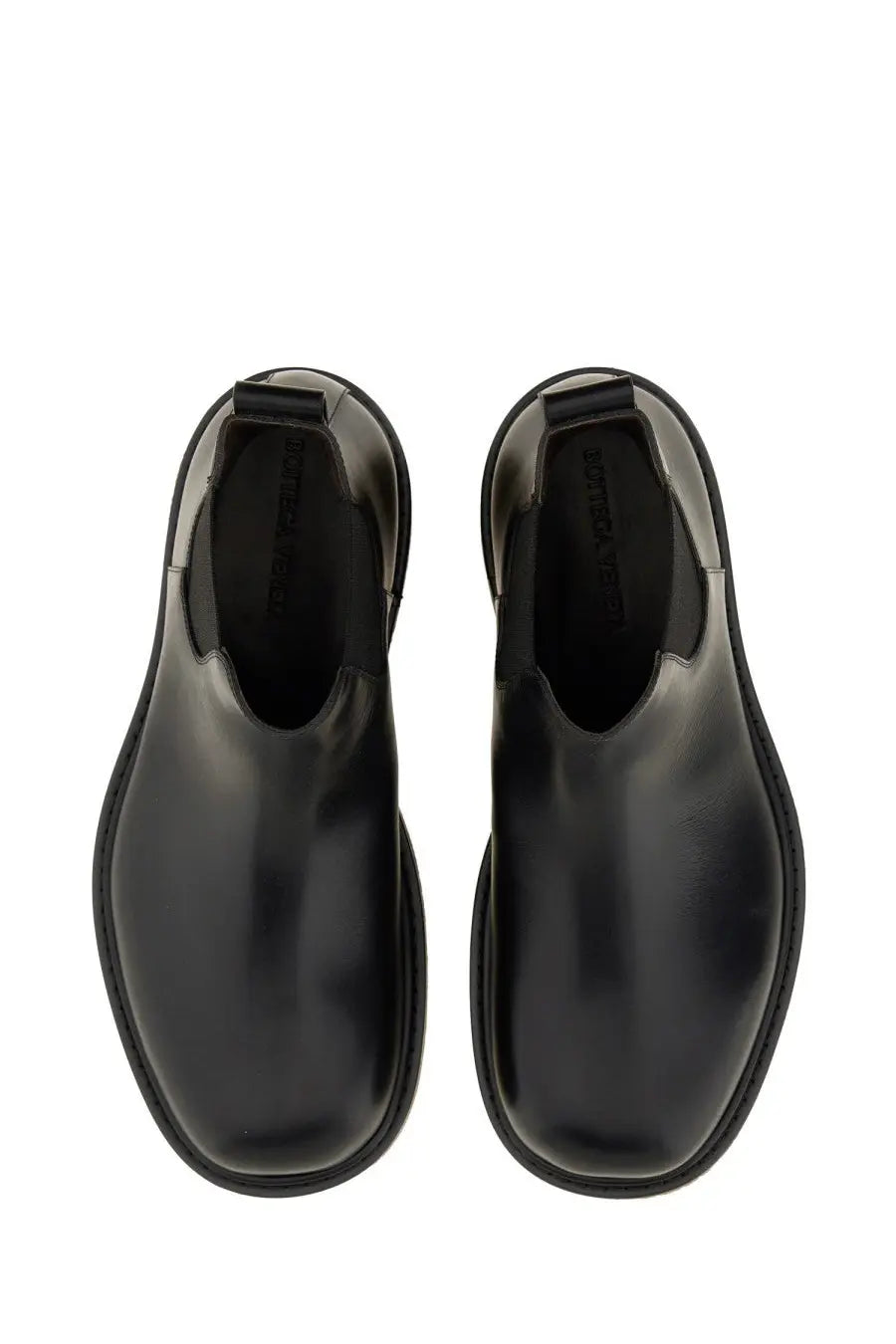 Bottega Veneta men’s chelsea boot haddock black with black patent leather chunky sole and elastic side gussets visible