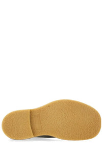 Tan rubber sole with textured grip and small embossed brand label on bottega veneta men’s chelsea boot haddock black