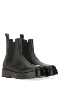 Bottega Veneta men’s black leather Chelsea boot Torino with chunky platform sole and elastic side panels