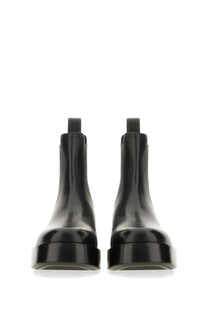 Bottega veneta men’s chelsea boot torino black in black patent leather with chunky platform sole front view