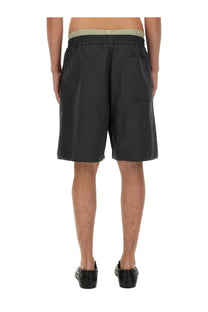 Black cotton shorts by bottega veneta featuring a ribbed waistband and side pockets in grey color