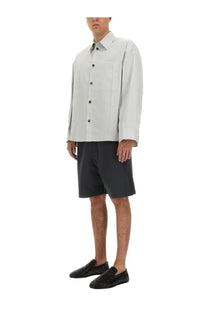 Light gray long sleeved cotton button up shirt with structured collar and front pocket in bottega veneta mens cotton shorts gray