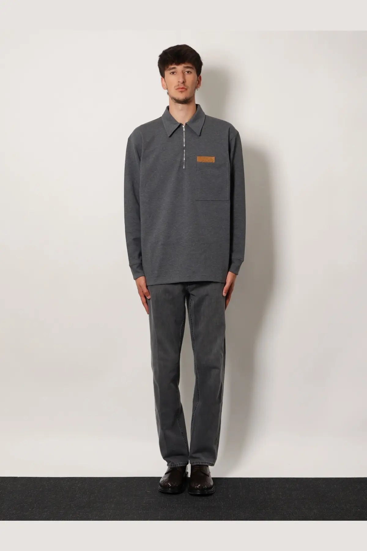 Bottega Veneta men’s grey cotton sweater with long sleeves, zipper placket, and tan chest pocket patch