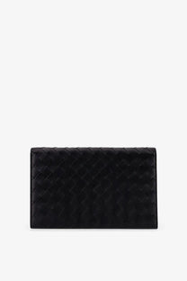 Bottega Veneta men’s black leather clutch bag with distinctive woven texture in leather material