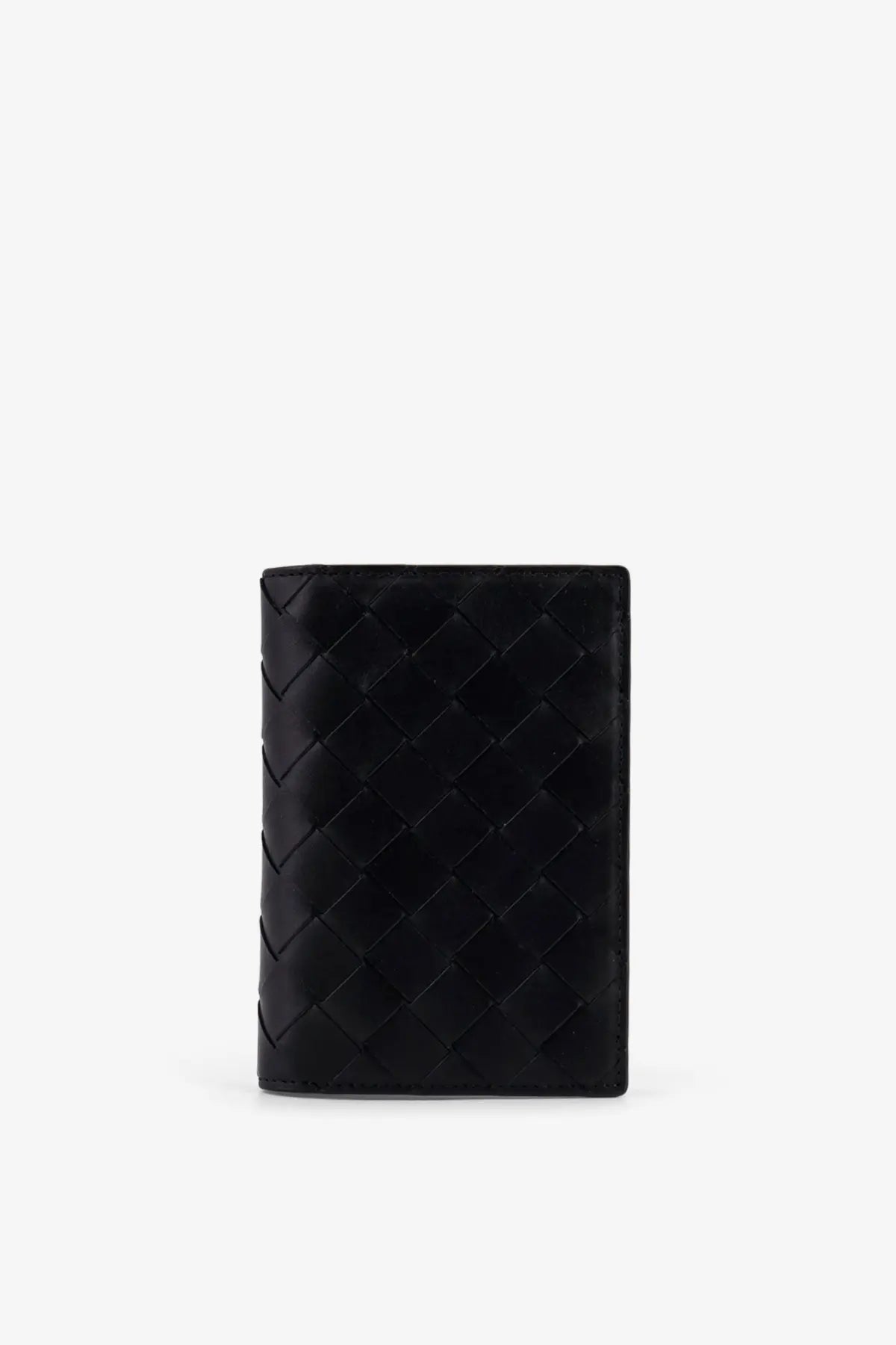 Bottega Veneta men’s black leather passport holder with distinctive woven pattern and sleek design