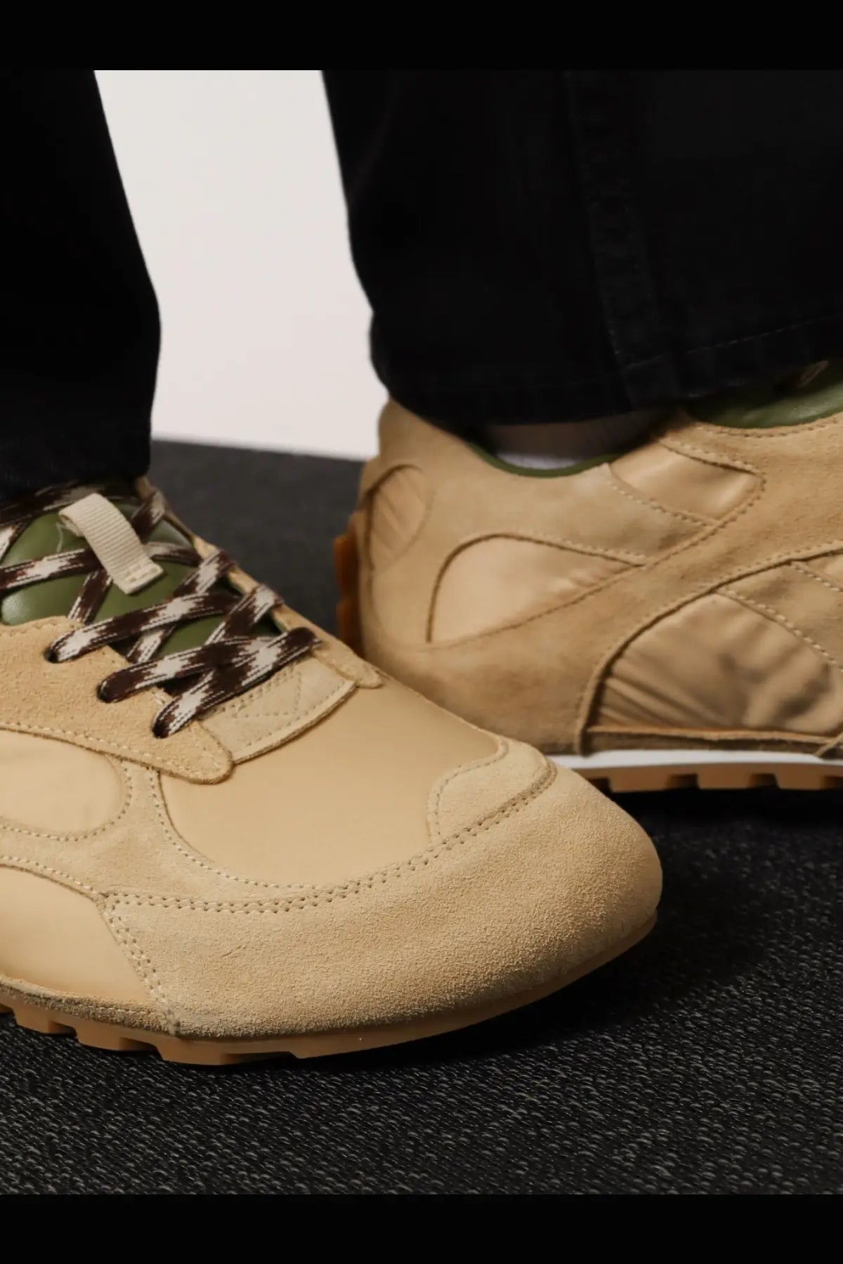 Bottega veneta men’s orbit flash tan suede sneakers with olive green accents and patterned laces in beige