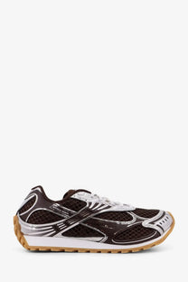 Bottega Veneta men’s orbit mesh sneaker in black and silver with tan rubber sole and branding on the side