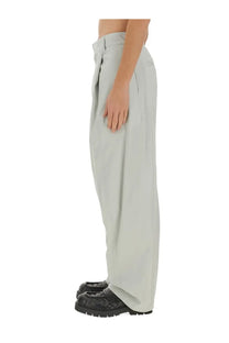 Light gray wide-leg bottega veneta men’s silk and cotton pants with relaxed draped silhouette and subtle waist pleats