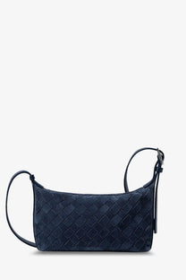 Dark blue woven leather crossbody bag with sleek structured design and adjustable strap for versatile use