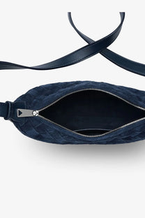 Deep navy blue quilted leather crossbody bag with silver zipper from Bottega Veneta men’s traveler suede shoulder bag silver collection