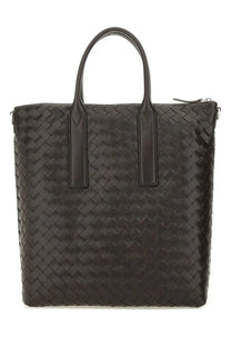 Bottega Veneta unisex North South woven tote bag in black leather with structured handles and zipper closure