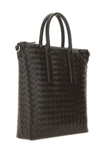 Bottega Veneta unisex north south tote bag in brown woven leather with structured handles and a modern design