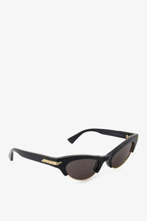 Bottega Veneta women’s angle black acetate cat-eye sunglasses with gold-tone metal accents and dark brown lenses