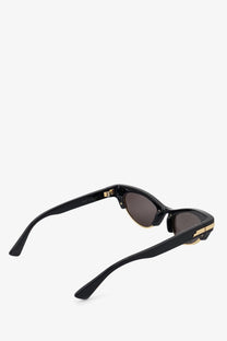 Bottega Veneta women’s angle acetate sunglasses in black with gold-tone metal accents and dark gray lenses