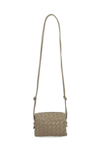 Beige woven leather crossbody bag with long adjustable strap bottega veneta women’s camera bag loop mini beige