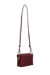 Bottega Veneta women’s camera bag loop mini in burgundy intrecciato leather with gold-tone hardware and long shoulder strap