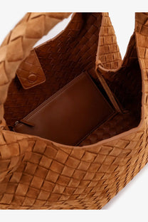 Tan woven leather tote bag with structured braided design and interior lining from bottega veneta campana collection