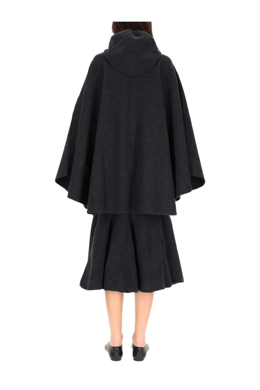 Bottega veneta women’s black woolen hooded cape with flowing draped silhouette and subtle texture viewed from back