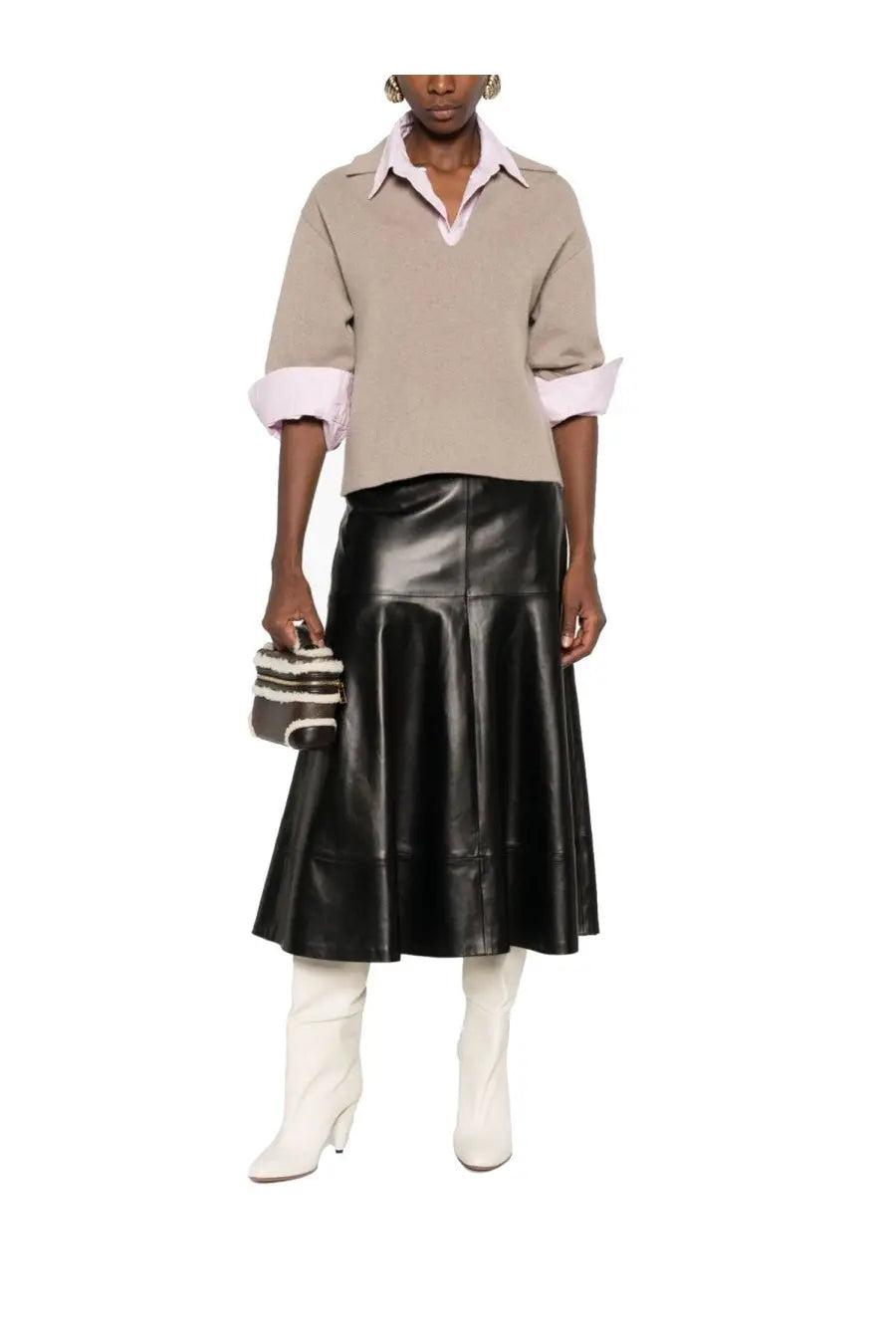 Black leather flared midi skirt showcasing smooth texture and structured design for stylish versatile wear