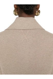 Beige knit blazer with structured collar and subtle x-shaped stitching at the back by bottega veneta