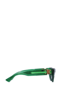 Bottega Veneta women’s cat eye sunglasses with green translucent acetate frame gold metal hardware and textured green strip