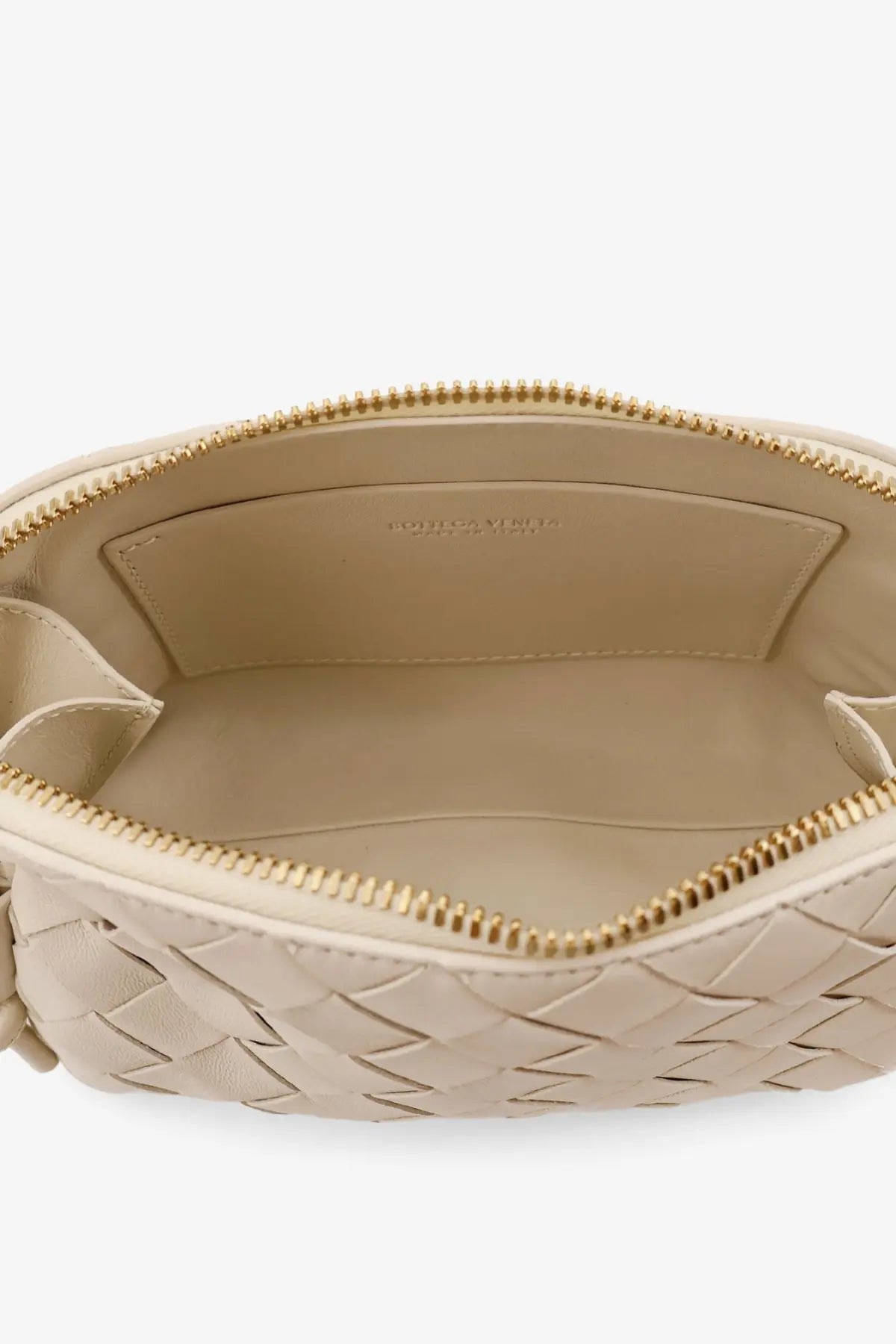 Beige woven leather clutch with gold-tone zipper and interior branding from bottega veneta concert pouch bag