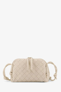 Beige woven leather crossbody bag with braided handles and central zipper closure by Bottega Veneta gold concert pouch