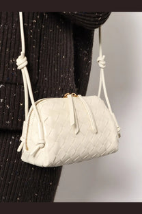Bottega Veneta women’s white woven leather crossbody bag with gold-tone hardware and knotted straps