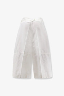 Bottega Veneta women’s white cotton Bermuda shorts with high waist, wide legs, and subtle pleats in lightweight fabric