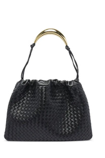 Bottega Veneta women’s dustbag bag black woven leather handbag with gold-tone circular handle visible from the front