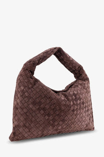 Bottega Veneta women’s brown suede shoulder bag with woven interlaced pattern and soft structured silhouette