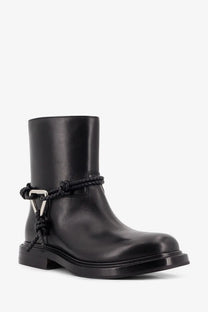 Bottega Veneta women’s black leather ankle boot with braided rope detail and silver-toned triangular buckle