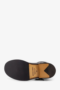 Bottega Veneta women’s james leather ankle boots in black patent with tan rubber sole and stitched label visible
