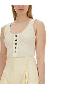 Cream-colored ribbed knit sleeveless jersey top with black front buttons by Bottega Veneta for women in white