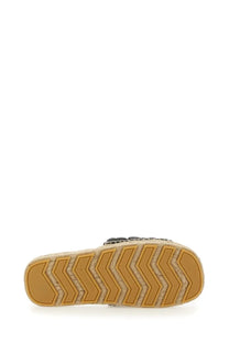 Bottega Veneta women’s black leather espadrille sandal with woven jute sole and tan chevron rubber outsole