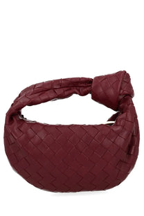 Bottega Veneta women’s mini Jodie bag in deep burgundy intrecciato leather with woven knot handle