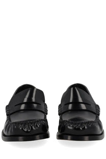 Bottega Veneta women’s Truman black moccasins with glossy patent leather and decorative braided side detailing