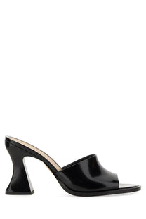 Bottega Veneta women’s black patent leather mule sandal with sculpted block heel shown from the back side
