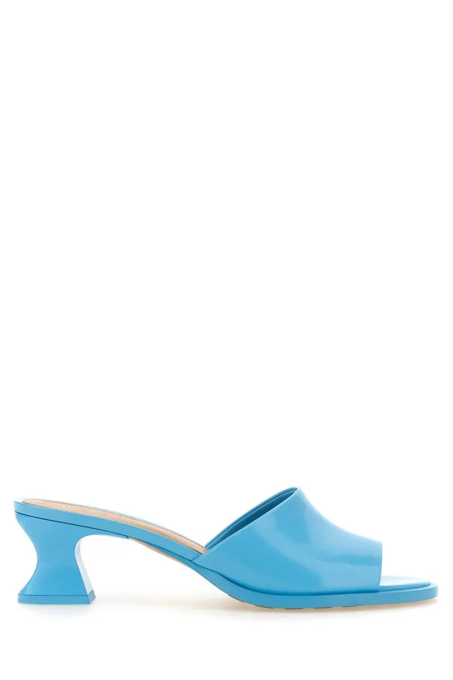 A sleek glossy sky blue leather mule sandal by Bottega Veneta with a sculpted block heel and open toe design