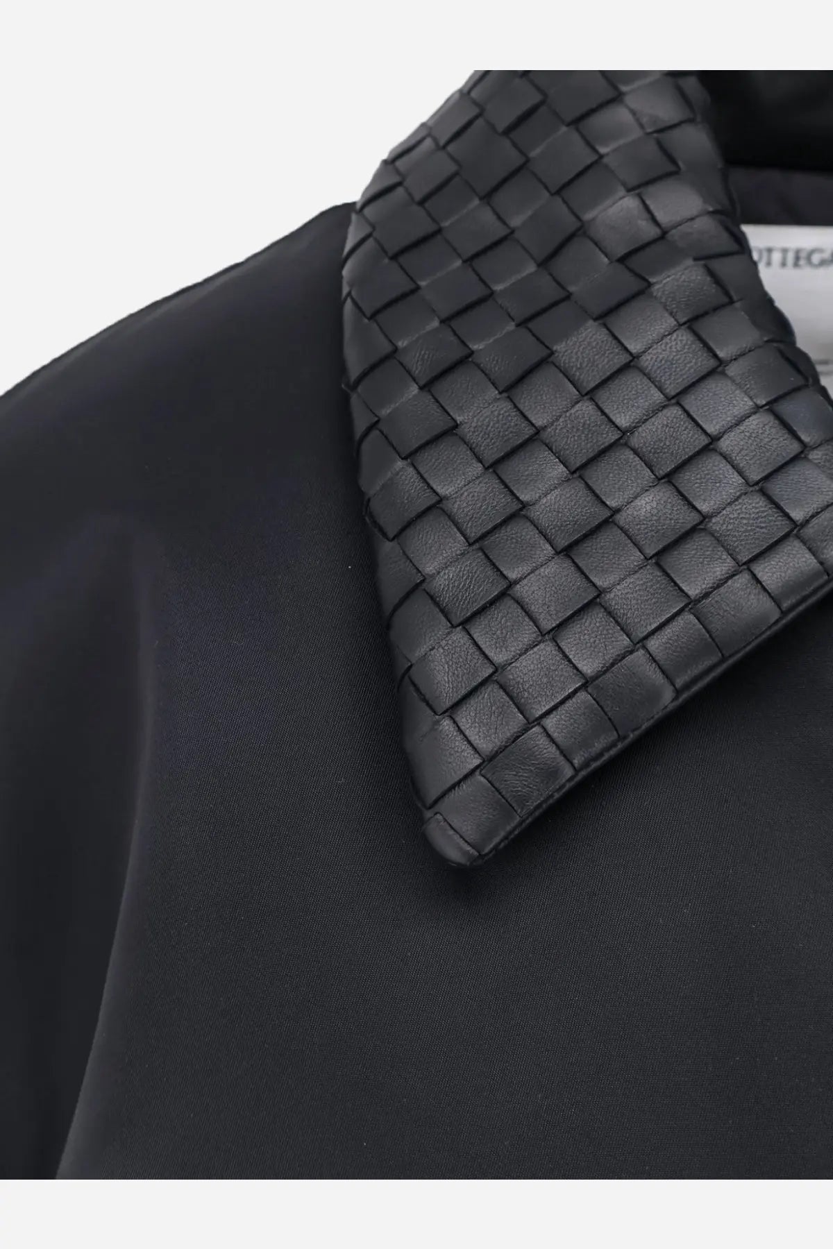 Black woven leather collar with interlaced pattern on bottega veneta women’s nylon jacket black