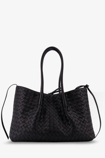 Black woven leather tote bag with structured handles and adjustable shoulder strap by Bottega Veneta women