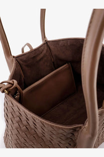 A taupe woven leather tote bag with structured interior and matching handles from Bottega Veneta Pinacoteca collection