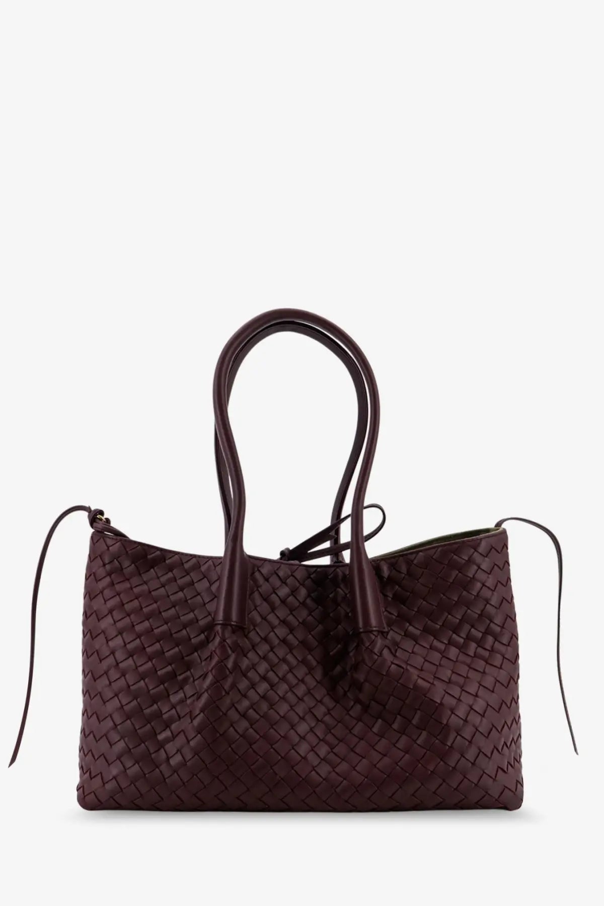 A deep burgundy woven leather tote bag with structured handles and adjustable shoulder straps by Bottega Veneta