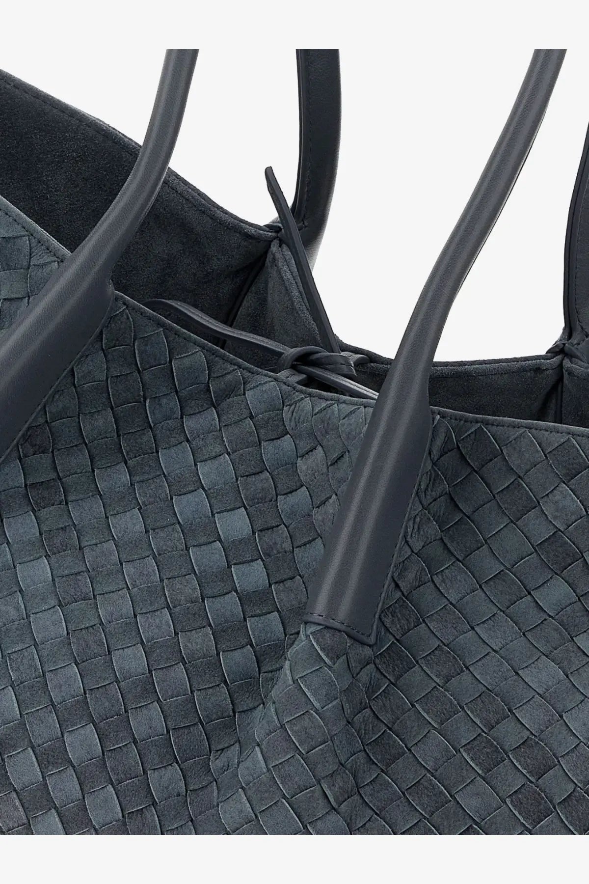Dark gray woven leather tote bag with structured handles and sleek textured surface by bottega veneta cloudly collection